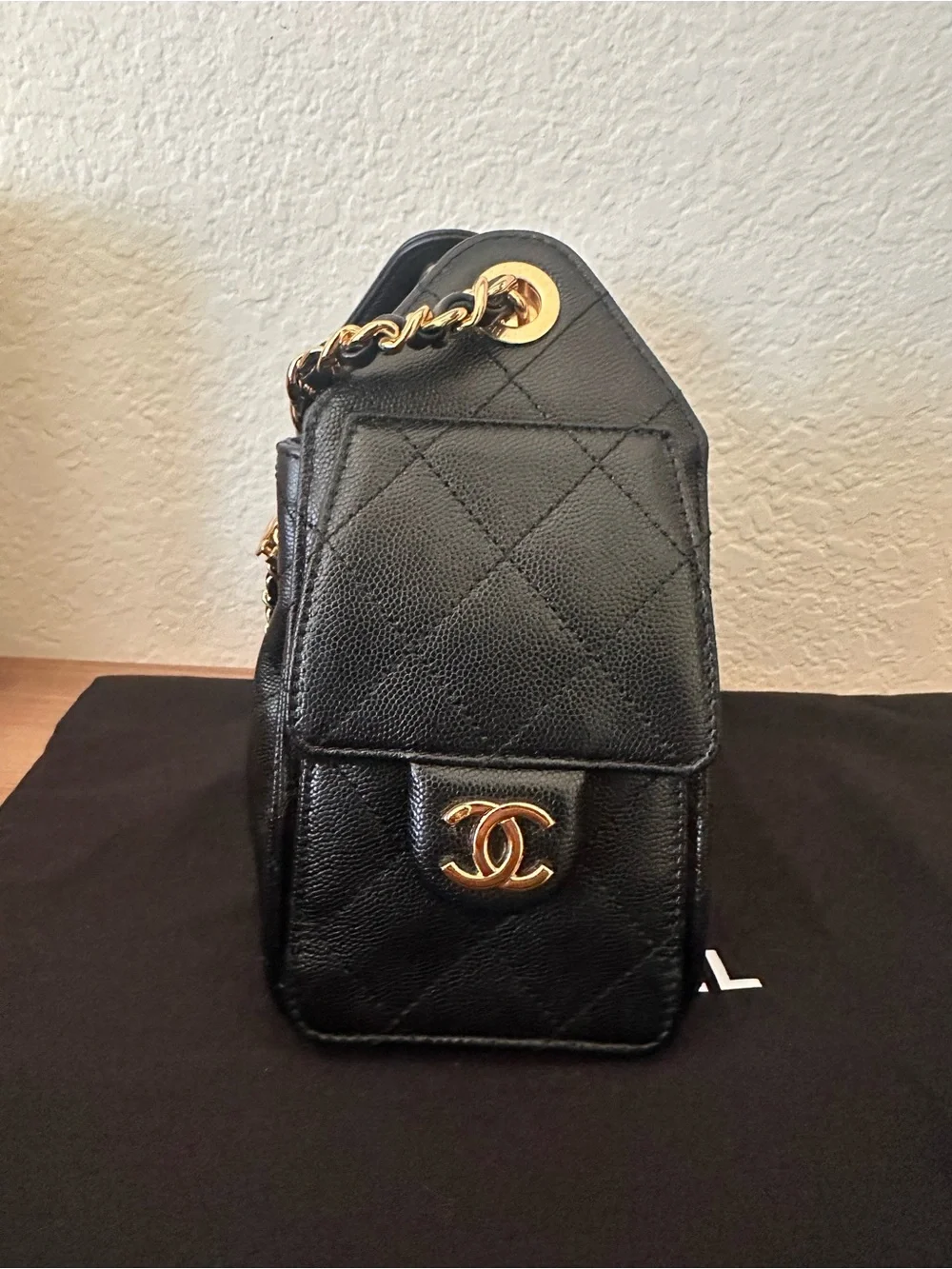 CHANEL 25 Mini Black Quilted Leather Drawstring Bucket Bag with Gold Hardware